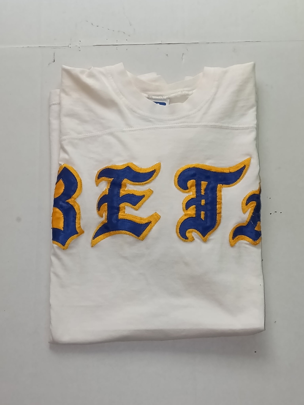 Vintage Russell Athletic White Short Sleeve Tee with Blue & Gold Appliqué
